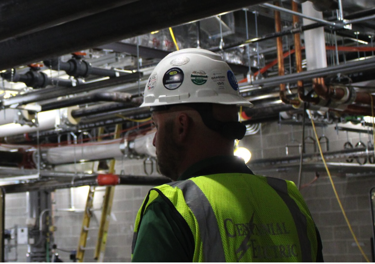 Centennial Electric worker in a building in Michigan