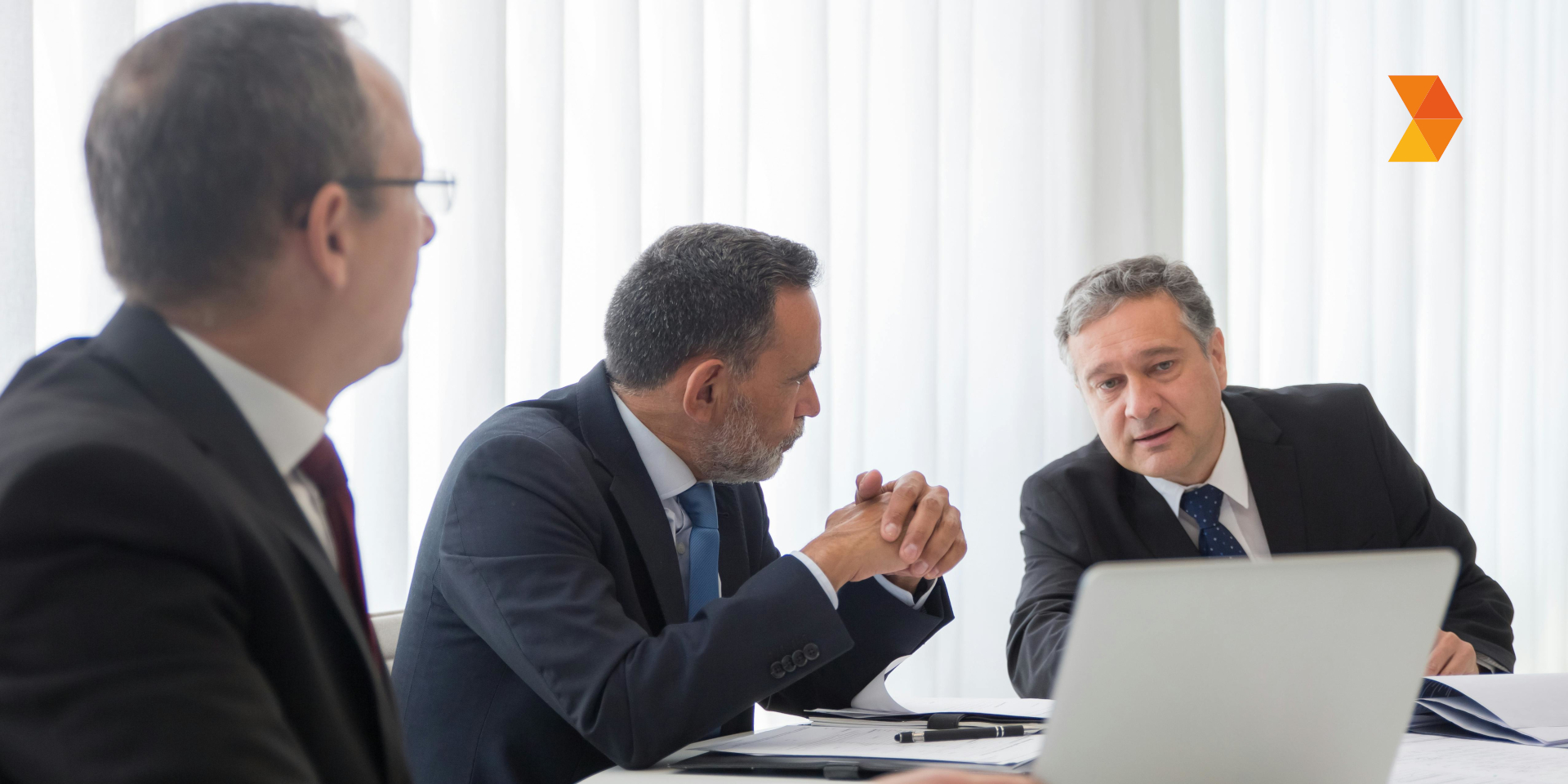 CEO and CFO meeting about planning at a desk with Preferred CFO